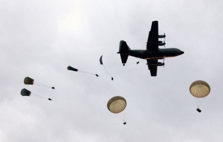 Soldiers from 3RAR on a parachute drill